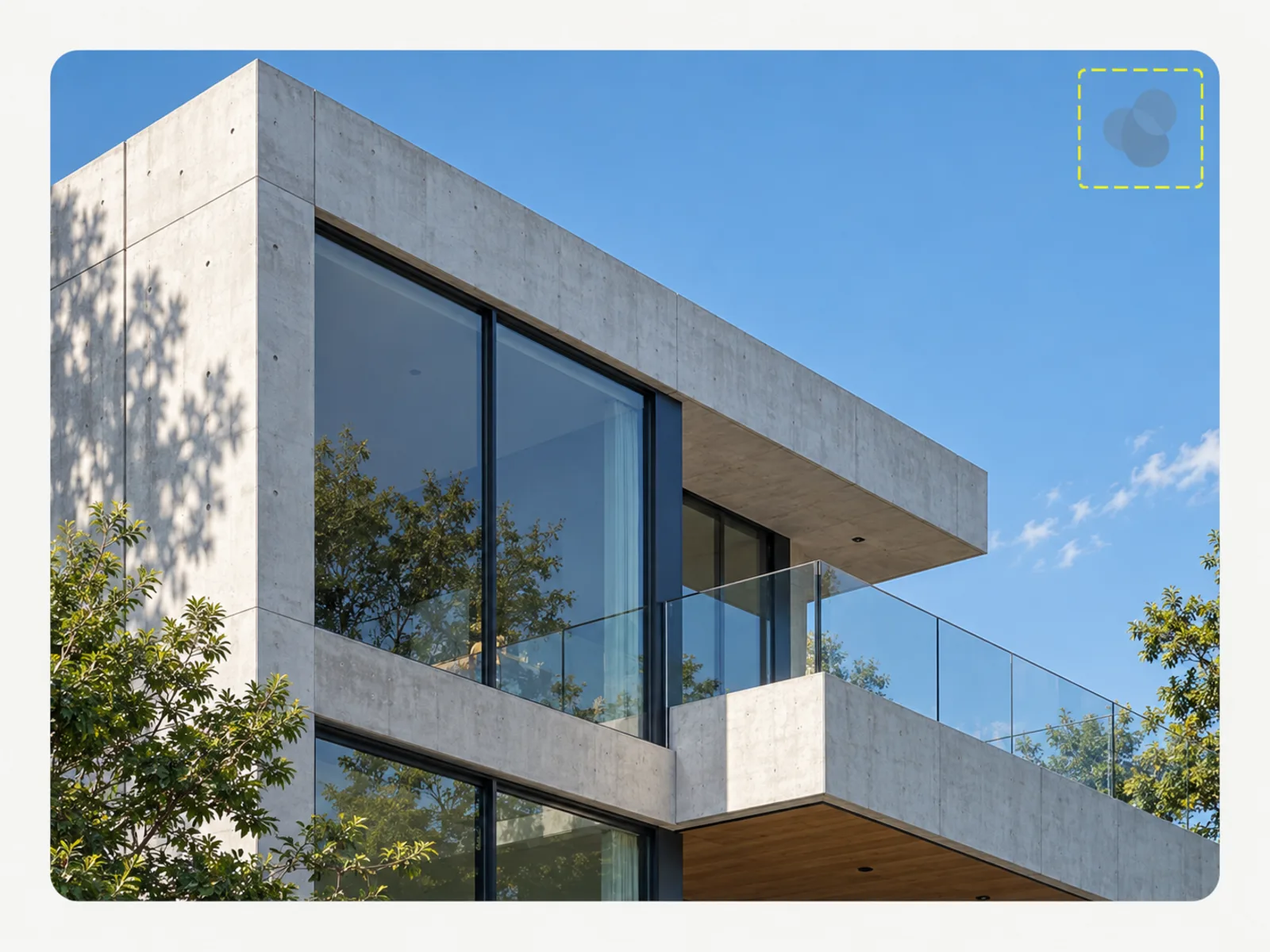 A modern building facade with a dashed selection box isolating one small marked corner while the rest is left untouched